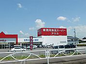 スーパー「アミカまで280m」