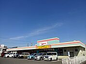 スーパー「パワーズまで940m」
