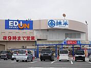 スーパー「綿半まで1100m」