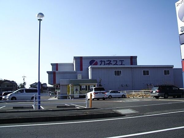 画像23:スーパー「カネスエまで2100m」