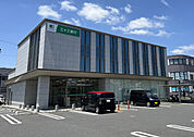 銀行「三十三銀行旭が丘支店まで959m」
