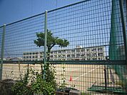 中学校「桑名市立明正中学校まで1594m」