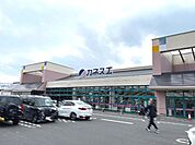 スーパー「カネスエ東員店まで1393m」