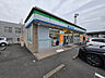 周辺：コンビニ「ファミリーマート亀山野村店まで1037m」