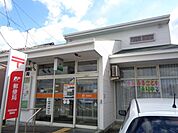 コンビニ「黒田町郵便局まで1100m」