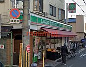 ローソンストア100摂津富田店 13m
