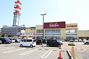 原信南万代店(733m)