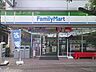 周辺：ファミリーマート 枚方岡東町店（306m）