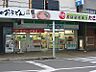 周辺：ファミリーマート 枚方公園駅前店（868m）