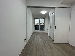 コンフォートフロンティア 1階1DKのリビング/ダイニング