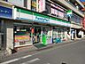 周辺：ファミリーマート北小金駅前店 447m