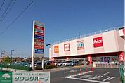 セブンタウン 徒歩5分。ショッピングセンター 330m