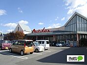 スーパー「マルナカ徳島空港店まで2174m」