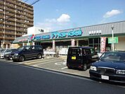 万代鶴見今津店 427m