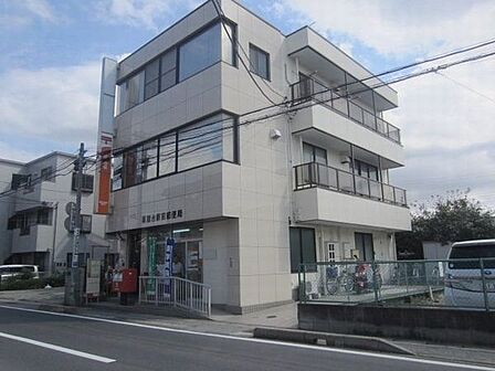 郵便局「薬園台駅前郵便局まで682m」