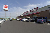 マルヨシセンター松縄店(スーパー)まで1494m
