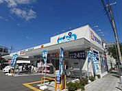 ウエルシア西淀川野里店 298m