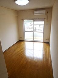 多摩都市モノレール 程久保駅 徒歩4分の賃貸マンション 1階1Kのリビング/ダイニング