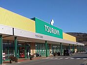 スーパー「ツルヤ神畑店まで1262m」