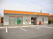郵便局「豊里郵便局まで912m」