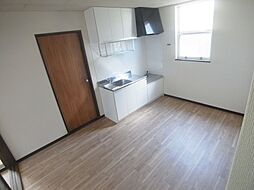 ウインズウメサト A 101 1階3DKのリビング/ダイニング