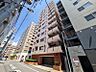 外観：【外観】　周囲の街並みと調和する落ち着いた色調。上質な日常を予感させる。