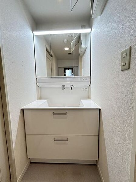 【リフォーム前】洗面脱衣所洗面化粧台はクリーニング予定です。選択パンは交換予定です。