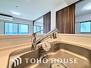 安全でおいしい水を手軽に。ボタンひとつで浄水と原水に切り替えられる浄水器一体型水洗を使用。