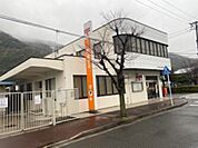 郵便局「安浦郵便局まで1122ｍ」