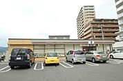 コンビニ「セブンイレブン広島五日市新宮苑店まで524ｍ」