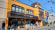 スーパー「ショージ牛田店まで1120ｍ」