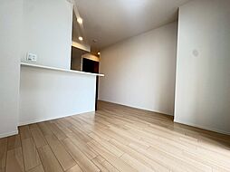 コーセー飯田 1階1LDKのリビング/ダイニング