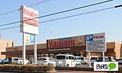スーパー「ディスカウントスーパーやましろやつなとり店まで584m」