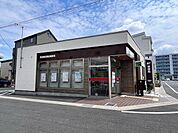 草加新田駅前郵便局 122m