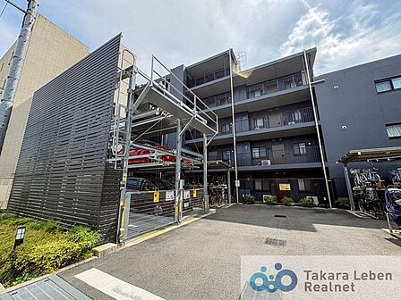 共用部分の駐車場、駐輪場の様子です。ご利用には使用細則がございます。
