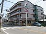 周辺：セブンイレブン 寝屋川萱島南店（442m）