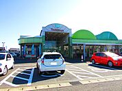 スーパー「トミダヤ島店まで282m」