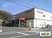 スーパー「トミダヤ三田洞店まで1120m」