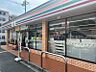 周辺：セブンイレブン 生駒東菜畑店（1099m）