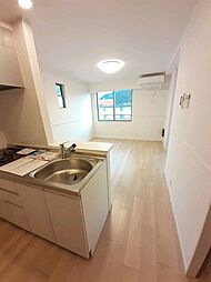 カーサ・グランデB 201 2階1LDKのリビング/ダイニング