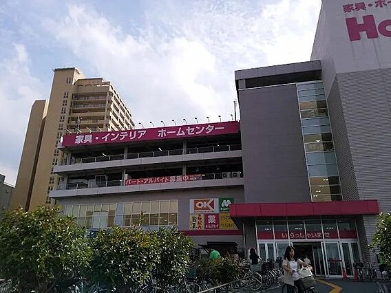 オーケー足立小...