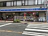 周辺：ローソン 苅田九丁目店（104m）