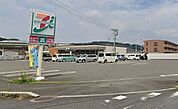 セブンイレブン鹿児島中山上西店 243m