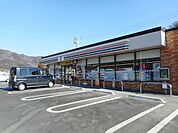 コンビニ「セブンイレブン　松本洞店まで950m」