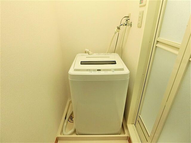 室内に全自動洗濯機を完備です。