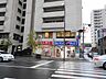 周辺：サンキュードラッグ下到津薬局（122m）