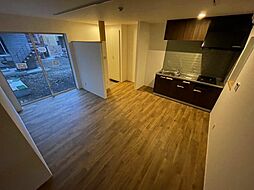 オプサス西新井 102 1階2LDKのリビング/ダイニング