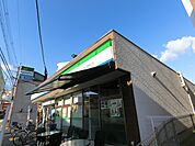 ファミリーマートJR千里丘駅西口店(コンビニ)まで50m