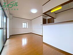 コーキア富洲原 3階1LDKのリビング/ダイニング