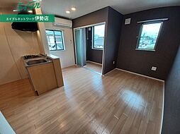 グリーンハイム小俣 2階1LDKのリビング/ダイニング